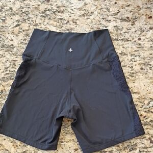Halara Cross-Waist Black Women’s Shorts-Laser-Cut Side Panels, Cell Phone Pocket